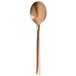 A close-up of a Walco Rose Gold stainless steel teaspoon with a metal handle.