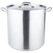 A large stainless steel Vollrath stock pot with handles and a lid.