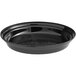A black round Delfin acrylic tray with holes in the bottom.
