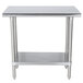 An Advance Tabco stainless steel work table with a stainless steel undershelf.