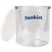 A clear Sunkist plastic container with a blue lid.