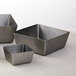 Three American Metalcraft stainless steel square bowls with a satin finish.