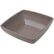 A gray square melamine bowl with a white background.