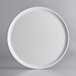 A Madison Avenue American White melamine plate with a round rim.