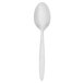A Walco stainless steel teaspoon with a white handle on a white background.