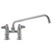 A chrome Equip by T&S deck-mounted faucet with 12 1/8" swing spout and lever handles.