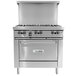A stainless steel U.S. Range commercial gas range with 4 burners, a 12" manual griddle, and an oven.