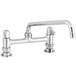 A chrome Equip by T&S deck mounted faucet with 2 lever handles and a swing spout.
