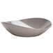 A Delfin Driftwood melamine bowl with a curved shape on a white background.