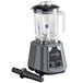 An AvaMix commercial blender with a black handle and silver blade on a counter.