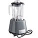 An AvaMix commercial blender with a clear Tritan container and toggle control.