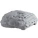 A grey JT Eaton rodent bait station designed to look like a rock with holes in it.