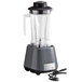 An AvaMix commercial blender with a black lid and a cord attached.