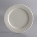 A white Libbey stoneware plate with a white rolled edge on a gray background.