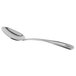 A Libbey dessert spoon with a silver handle and a silver spoon.