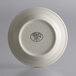 A white Libbey stoneware plate with a white rim.
