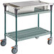 A Metro Prepmate MultiStation with Super Erecta Pro shelving and accessory pack on a green metal cart.