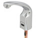 A T&S chrome hands-free sensor faucet with a copper pipe.