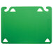 A green plastic rectangular cutting board with holes.