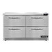 A stainless steel Continental undercounter freezer with four drawers.