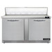 A Continental Refrigerator stainless steel refrigerated sandwich prep table with two doors.