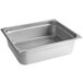 A silver Choice stainless steel steam table pan on a counter with a wire rack inside.