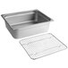 A stainless steel Choice 1/2 Size steam table pan on a metal grid.