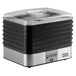 A black and silver Weston Digital Plus Food Dehydrator on a counter with a glass lid.