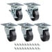 A set of four Avantco plate casters with black rubber wheels and mounting hardware.