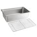A stainless steel Choice steam table pan with a footed wire rack.