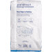 A white paper bag of ADM Premium Baker's Flour with blue text.