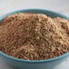 A bowl of Bob's Red Mill ground flaxseed meal.