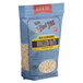 A white bag of Bob's Red Mill gluten-free whole grain rolled oats.