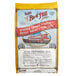 A red, white, and yellow bag of Bob's Red Mill Extra-Thick Whole Grain Rolled Oats.