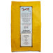 A yellow bag of Bob's Red Mill Gluten-Free Organic Brown Rice Flour with black text on it.