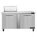 A Continental Refrigerator stainless steel 2 door refrigerated sandwich prep table on a white counter.