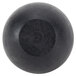 A black round rubber foot with a circle in the middle.