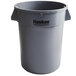 A gray Continental 32 gallon plastic trash can with the word "Huskee" on it.