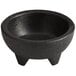 A black Choice Thermal Plastic molcajete bowl with three legs.
