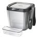 An OXO clear plastic ice bucket with lid and garnish tray.
