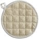 A white terry cloth round pot holder with white stitched edges.