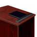 A tablet on a mahogany podium.
