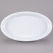 A white oval platter with a rim.