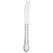 A Walco stainless steel butter knife with a white handle and silver blade.