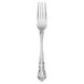 A Walco stainless steel dinner fork with a silver handle.