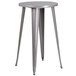 A Flash Furniture round silver metal bar height table with stools.