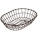 An American Metalcraft bronze oval wire basket with a curved design and a handle.