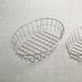 Two American Metalcraft stainless steel wire baskets on a white surface.