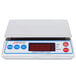 A white Cardinal Detecto digital portion scale on a counter.