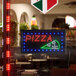 A rectangular LED sign that says "Pizza" in red lights.